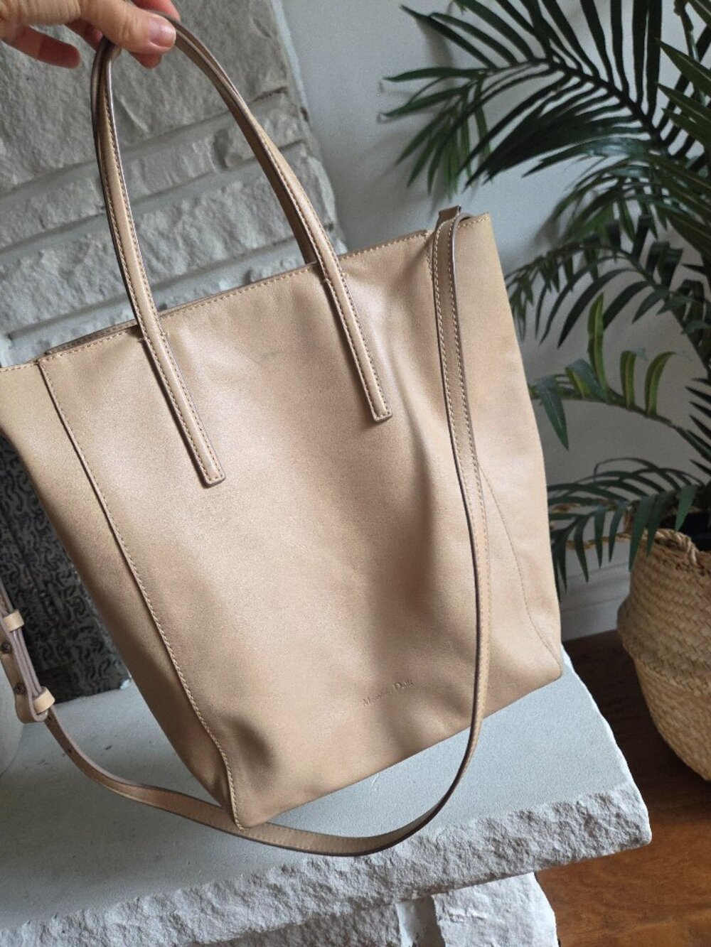 Massimo Dutti beige leather tote bag featuring dual top carry handles and an adj